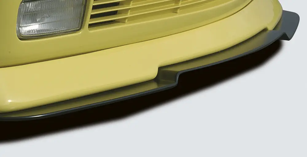 Kup Teď Rieger lipa pod přední nárazník pro BMW řada 3 E30 kabriolet, kupé, sedan, touring, plast ABS bez povrchové úpravy, pod přední spoiler Rieger obj. kód Y 00038011