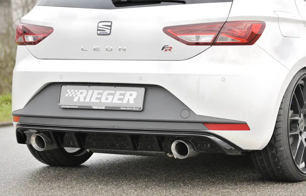 Originální Rieger vložka zadního nárazníku pro Seat Leon FR 5F 3-dvéř. (sc), 5-dvéř. před faceliftem, plast ABS lakovaný do černé lesklé barvy, pro sportovní koncovky na obou stranách 100 mm
